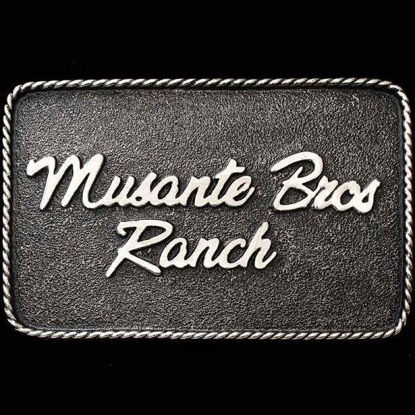 The Huntington Custom Buckle is perfect for adding personalized lettering like your Name, Company Logo, or Ranch Brand. The simple matted, German Silver base with our signature antique finish is a fantastic base for your customizations. Detailed wit